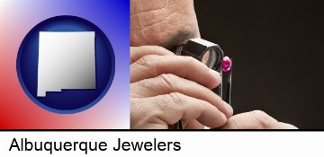 a jeweler examining a jewel in Albuquerque, NM
