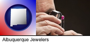 Albuquerque, New Mexico - a jeweler examining a jewel