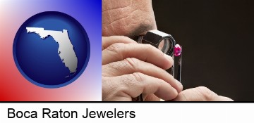 a jeweler examining a jewel in Boca Raton, FL