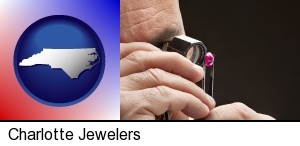 Charlotte, North Carolina - a jeweler examining a jewel