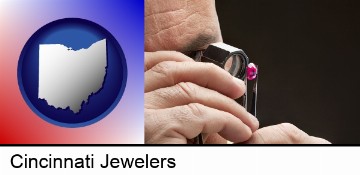 a jeweler examining a jewel in Cincinnati, OH