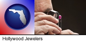a jeweler examining a jewel in Hollywood, FL