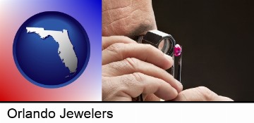 a jeweler examining a jewel in Orlando, FL