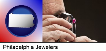 a jeweler examining a jewel in Philadelphia, PA
