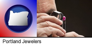Portland, Oregon - a jeweler examining a jewel