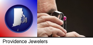 a jeweler examining a jewel in Providence, RI