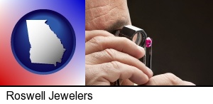 a jeweler examining a jewel in Roswell, GA