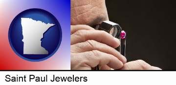 a jeweler examining a jewel in Saint Paul, MN