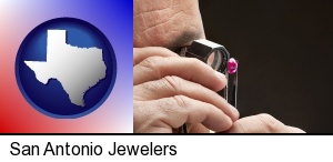 San Antonio, Texas - a jeweler examining a jewel