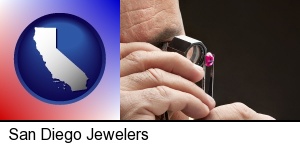 San Diego, California - a jeweler examining a jewel