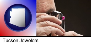 Tucson, Arizona - a jeweler examining a jewel