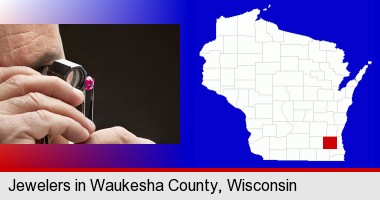 a jeweler examining a jewel; Waukesha County highlighted in red on a map