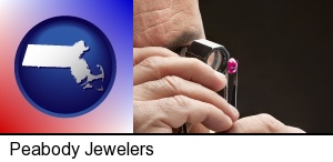 a jeweler examining a jewel in Peabody, MA