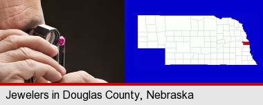 a jeweler examining a jewel; Douglas County highlighted in red on a map