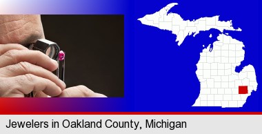 a jeweler examining a jewel; Oakland County highlighted in red on a map